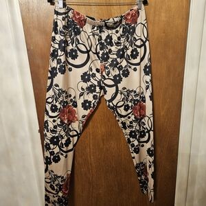 Beige Floral Print Leggings with Black and Red Accents
